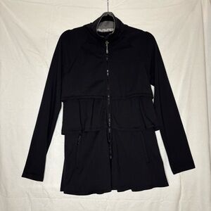 ATHLETA Black Twirly Ruffle Jacket With Tiered Layers Stretch. Measured for size